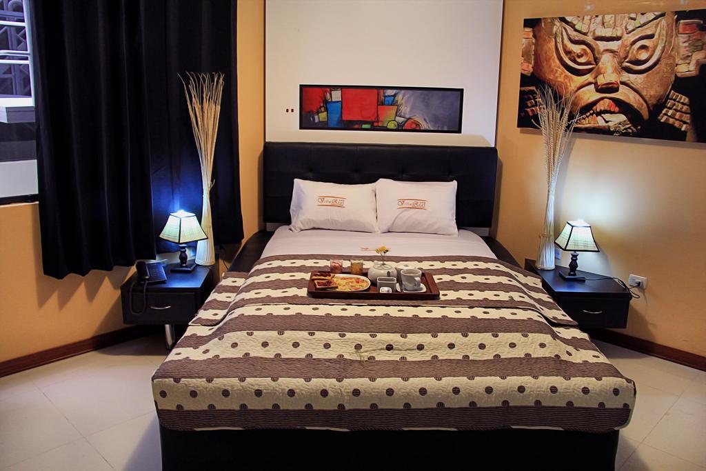 Villa Real Hotel & Suites Chiclayo Pokoj fotografie